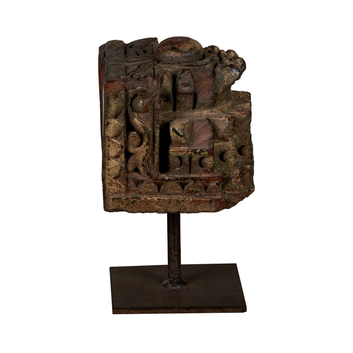 Carved Wooden Pillar Capital Fragments on Iron Stands by Studio Vastu