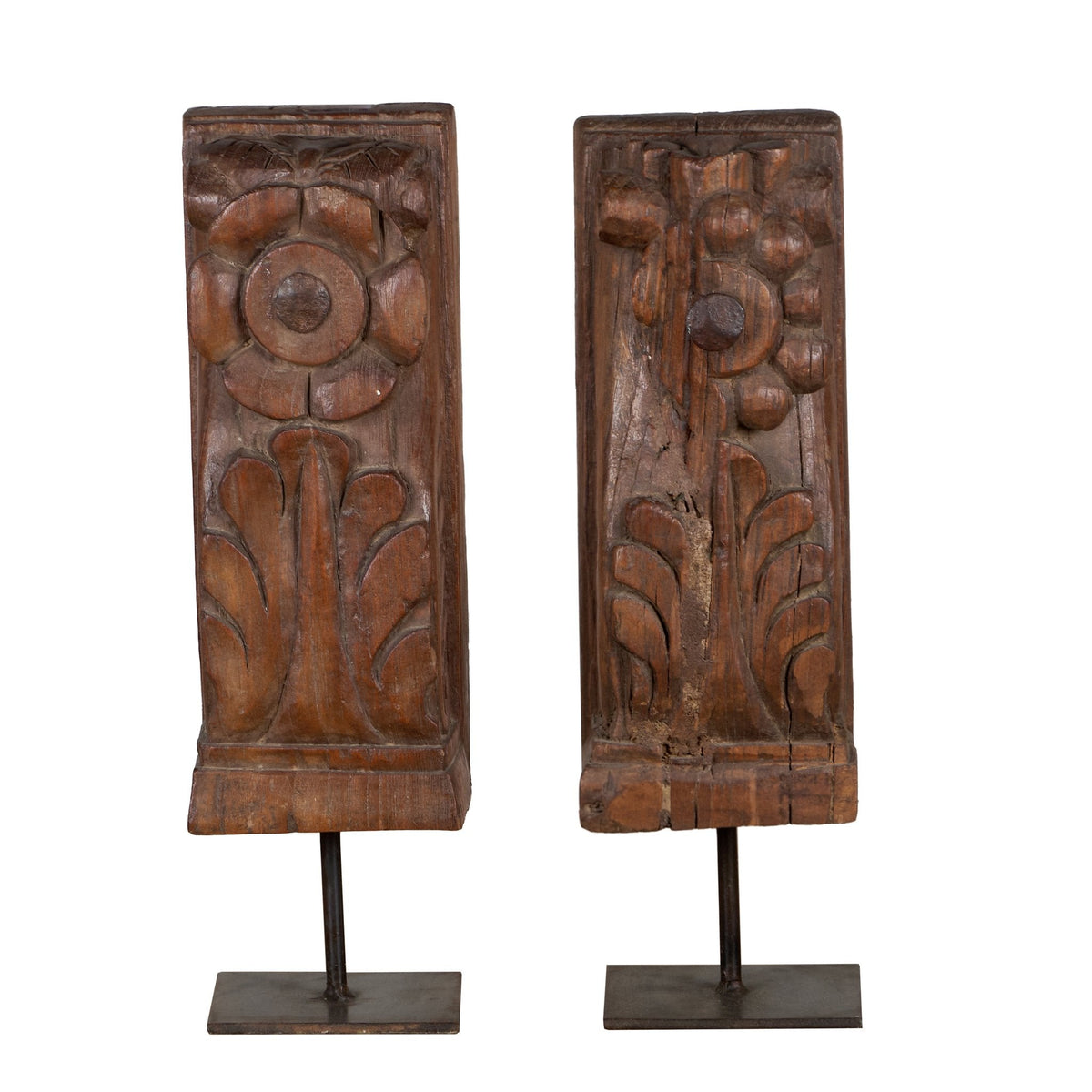 Floral Wood Carving Brackets on Iron Stands by Studio Vastu