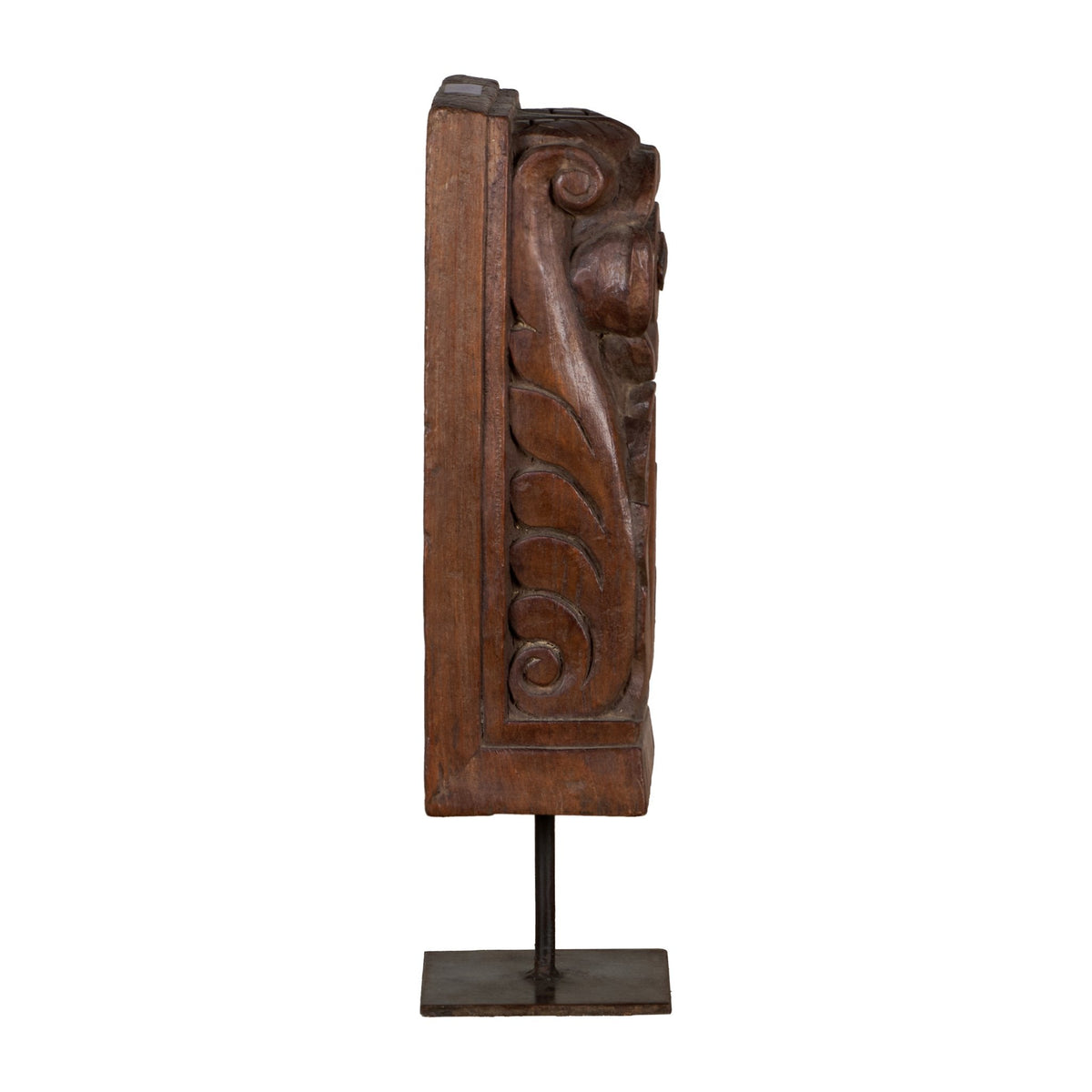 Floral Wood Carving Brackets on Iron Stands by Studio Vastu