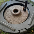 Hand-Carved Stone Grinder Table by Studio Vastu