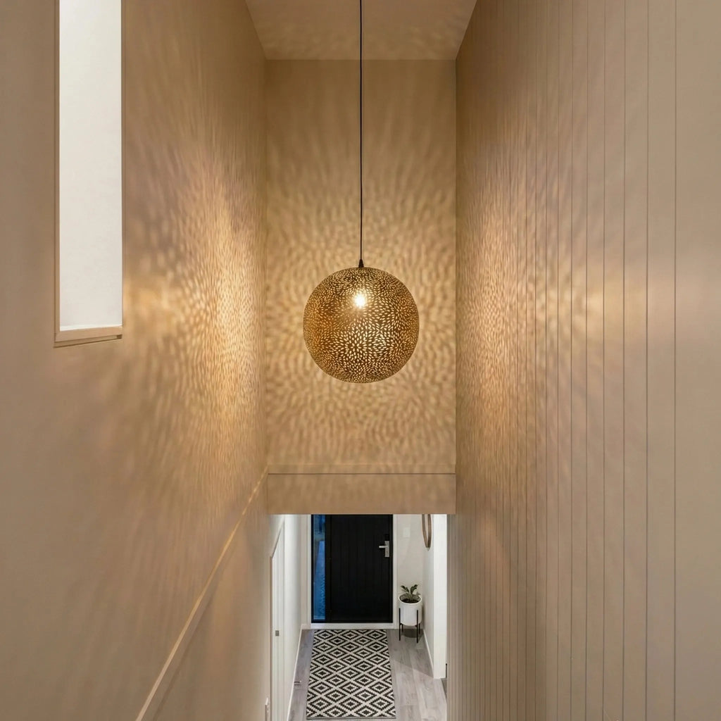 Perforated Brass-Finish Steel Orb Pendant by Studio Vastu